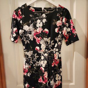 Black floral work to evening dress